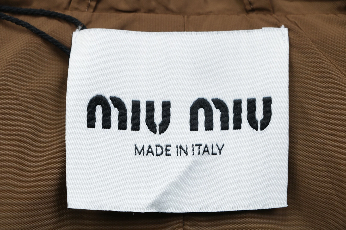 Miu Miu Single-Breasted Glossy Trench Coat Brand label