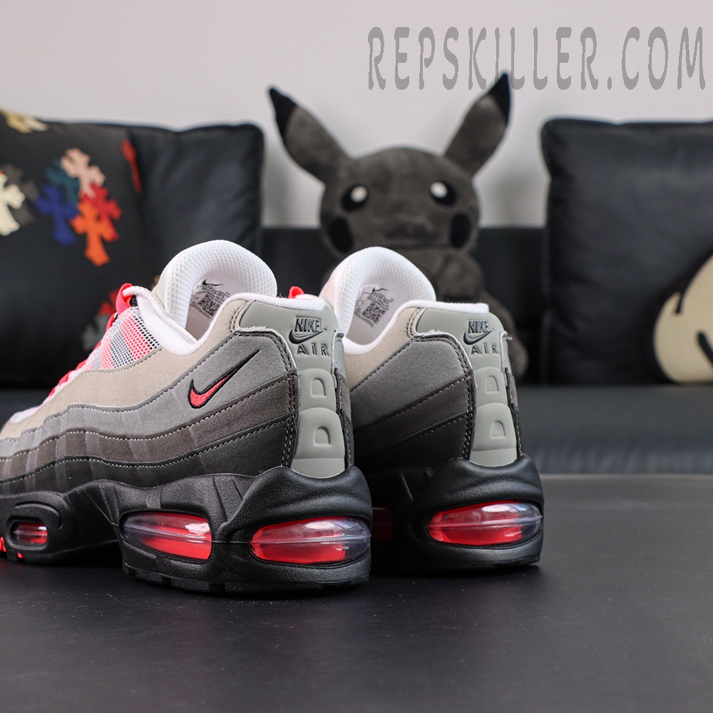 Top-down view of Nike Air Max 95 Big Bubble Solar Red showing lace system and tongue branding