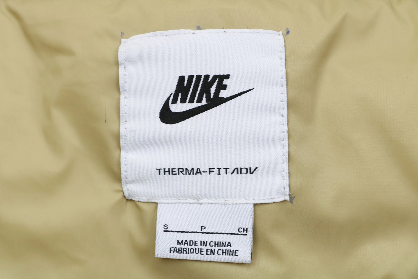 Nike Windrunner Diagonal Quilted Hooded Down Jacket White Brand label