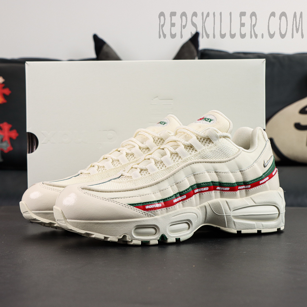 Three-quarter angle view of Undefeated x Nike Air Max 95 “Sail” highlighting Air cushioning