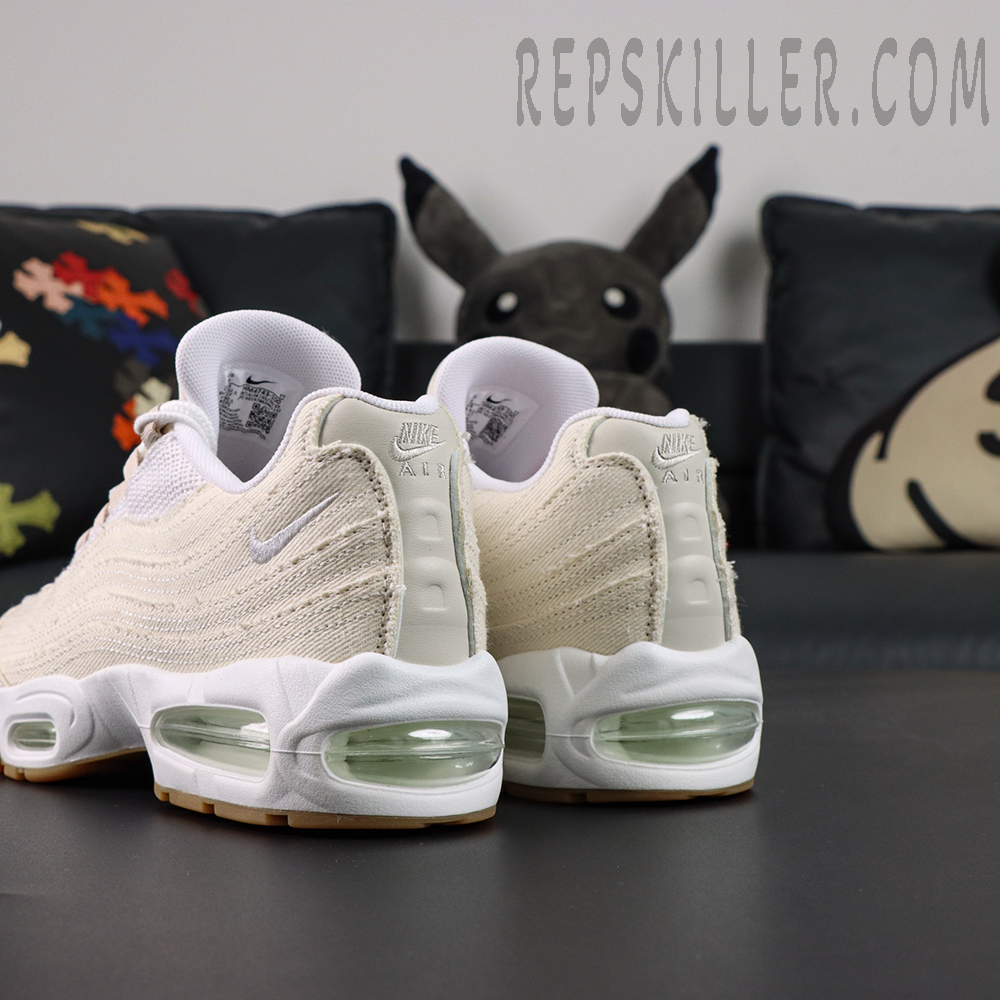 Levi’s x Nike Air Max 95 OG “Light Orewood Brown” heel view with visible Air Max cushioning and Nike Air embroidery