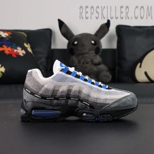 Undefeated x Nike Air Max 95 “Concord” sneakers, side profile with grey suede upper and UNDEFEATED branding