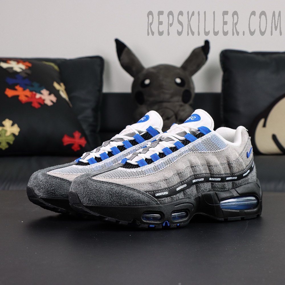 Undefeated x Nike Air Max 95 “Concord” sneakers, front side angle showing blue accents and Air Max midsole