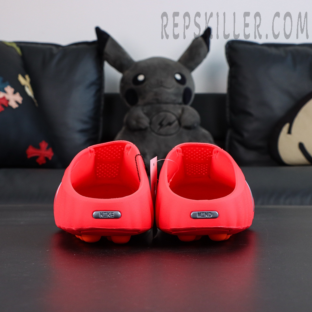 Nike Mind 001 Mule “Solar Red” rear view highlighting symmetrical shape and branding
