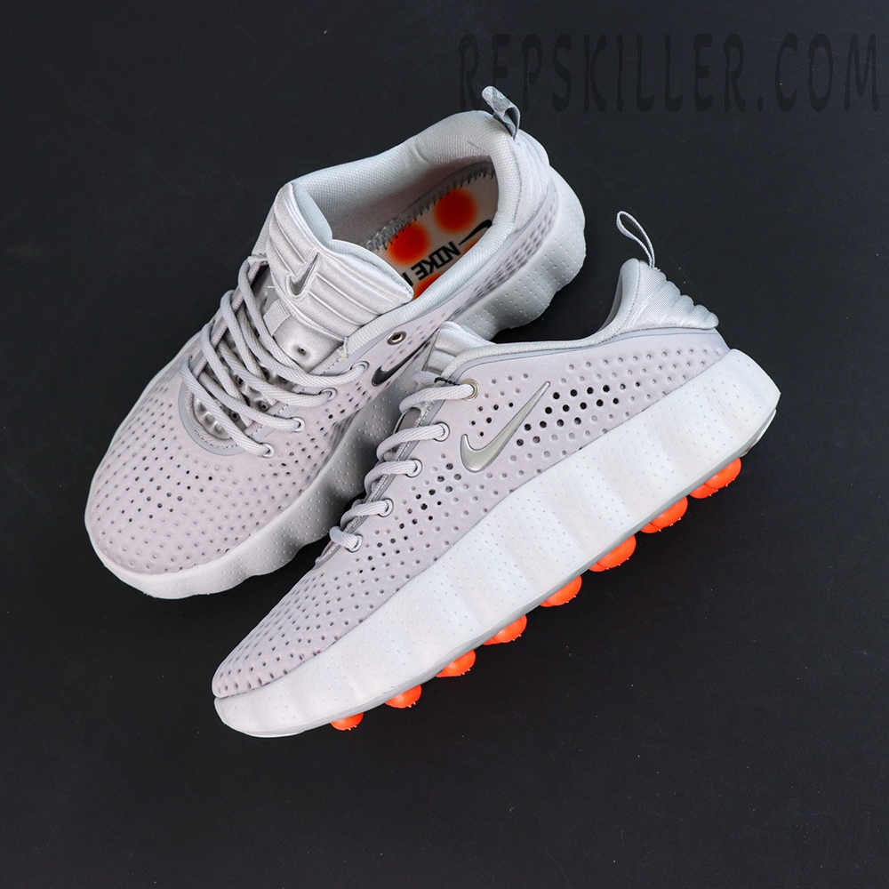 Nike Mind 002 “Light Smoke Grey” top view with minimalist design and perforated upper