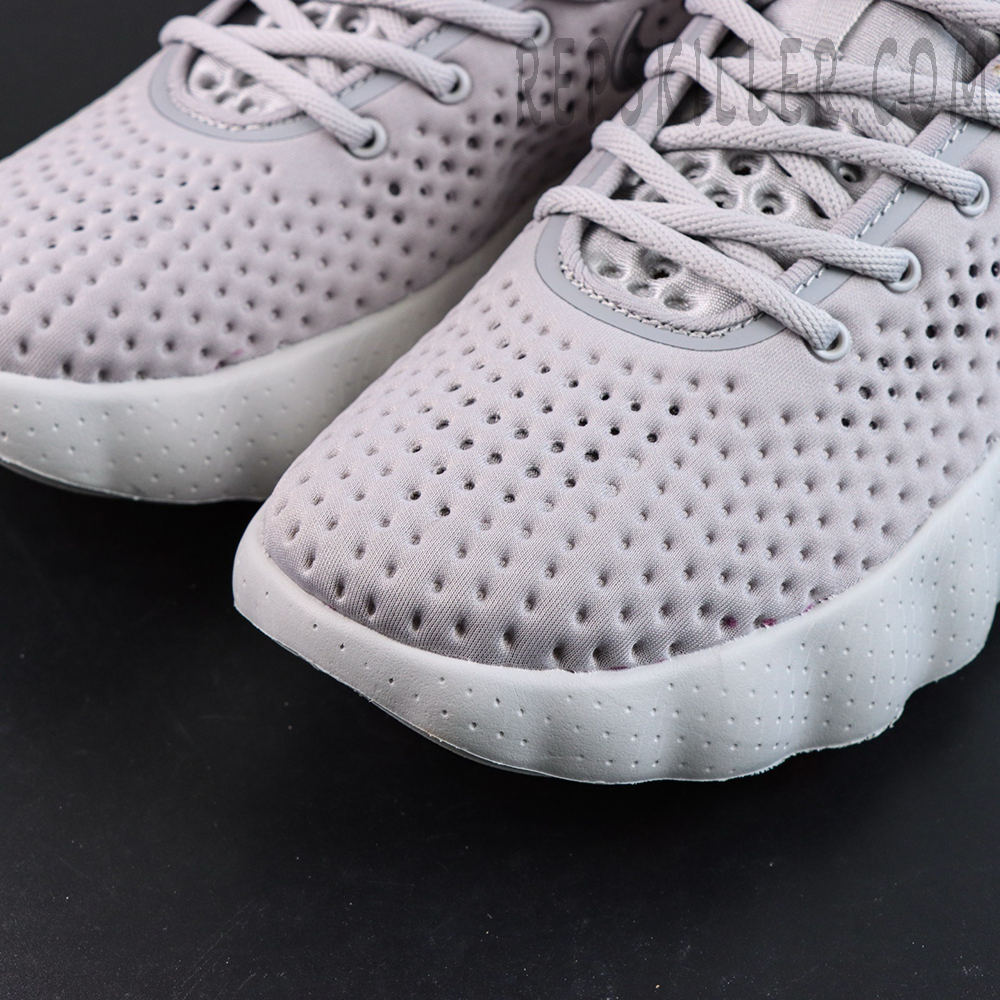 Nike Mind 002 “Light Smoke Grey” toe detail with dense perforations and soft material