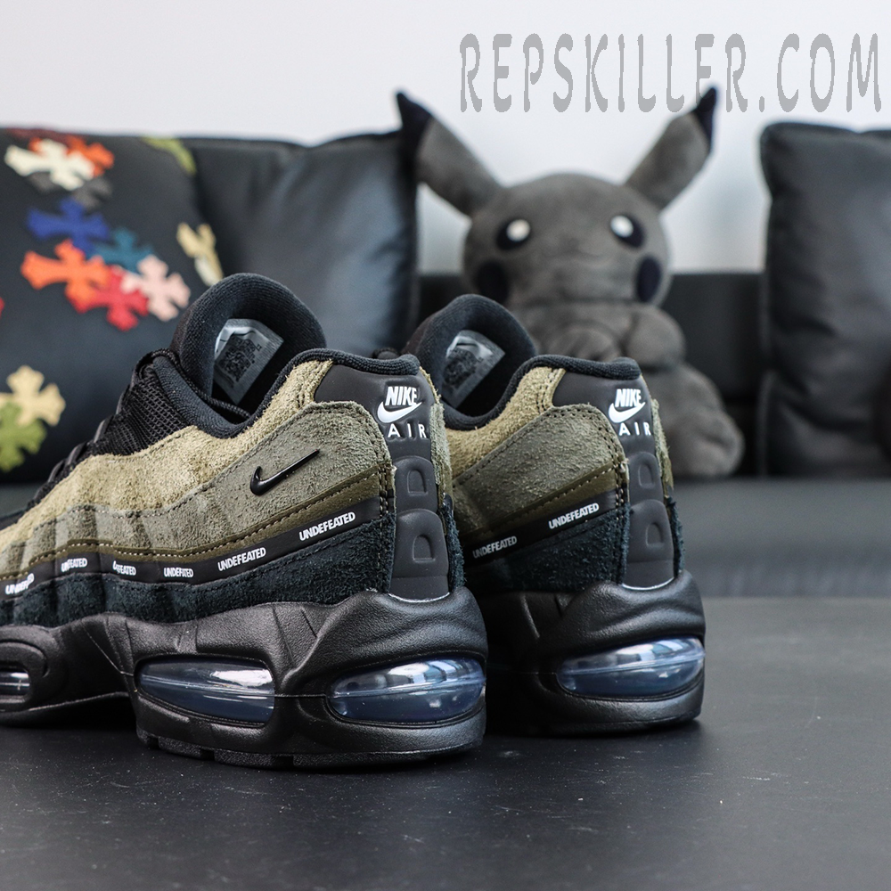 Undefeated x Nike Air Max 95 “Medium Olive” sneakers, heel view featuring Nike Air branding and visible Air units