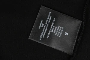 Fear of God Essentials Year Graphic Logo T-Shirt Wash label