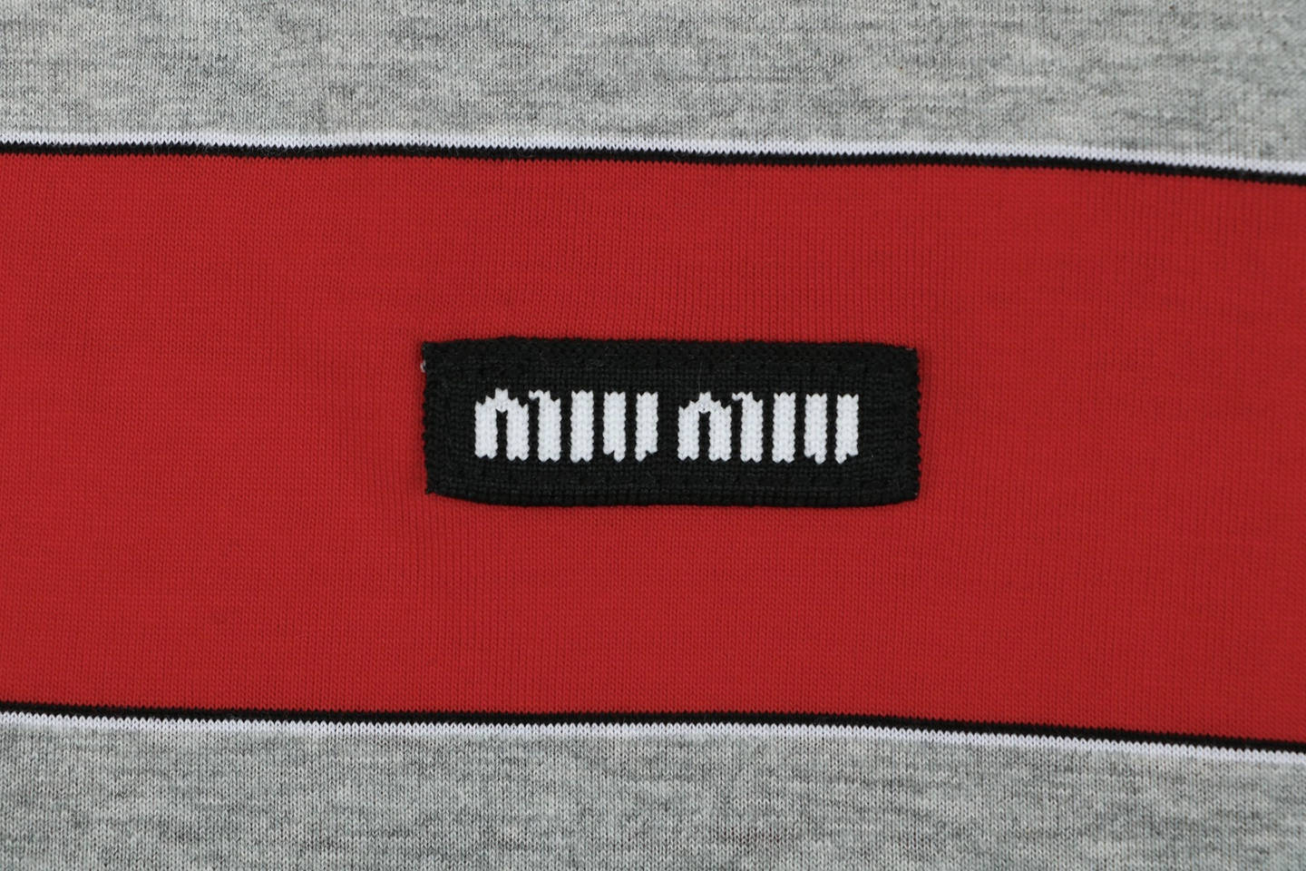 Miu Miu Striped Polo Shirt Brand label