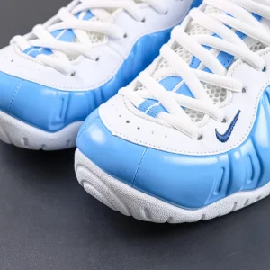 Nike Air Foamposite Pro toe box detail with glossy blue Foamposite and white leather