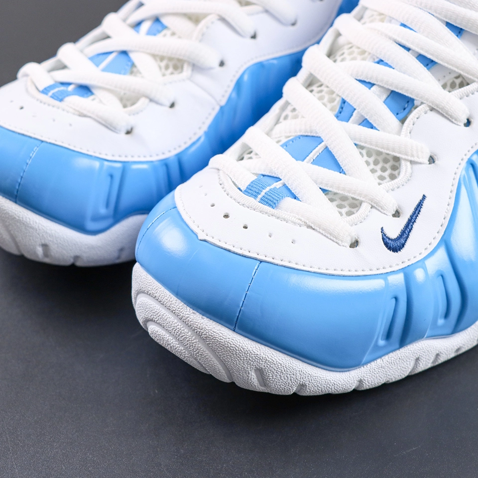 Nike Air Foamposite Pro toe box detail with glossy blue Foamposite and white leather
