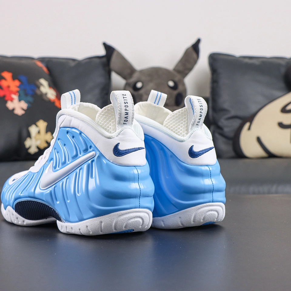 Nike Air Foamposite Pro rear lateral view with blue-white contrast and sculpted shell