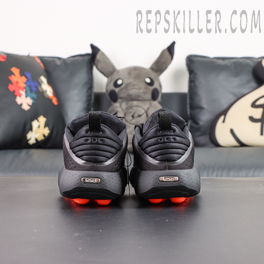 Nike Mind 002 Black Hyper Crimson rear view with pod-based outsole