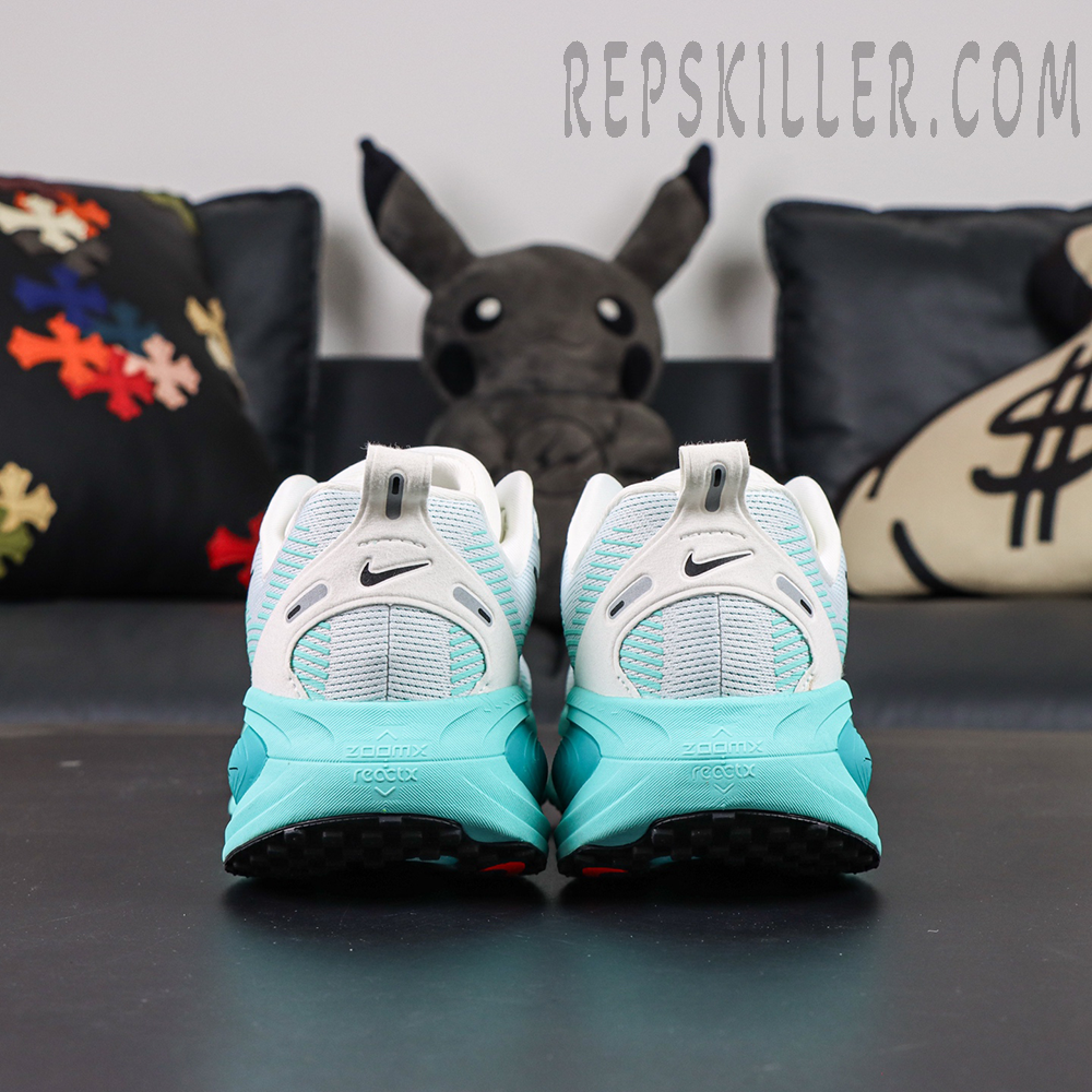 Nike Vomero 18 GS Geode Teal rear view with supportive heel structure and cushioning