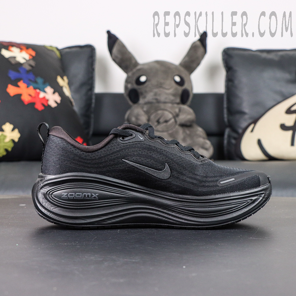 Nike Vomero Plus side profile showcasing cushioned sole and performance design
