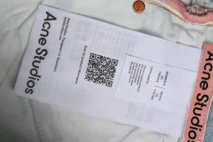 Acne Studios 1981M Trompe-l’œil Distressed Wide-Leg Jeans Wash label