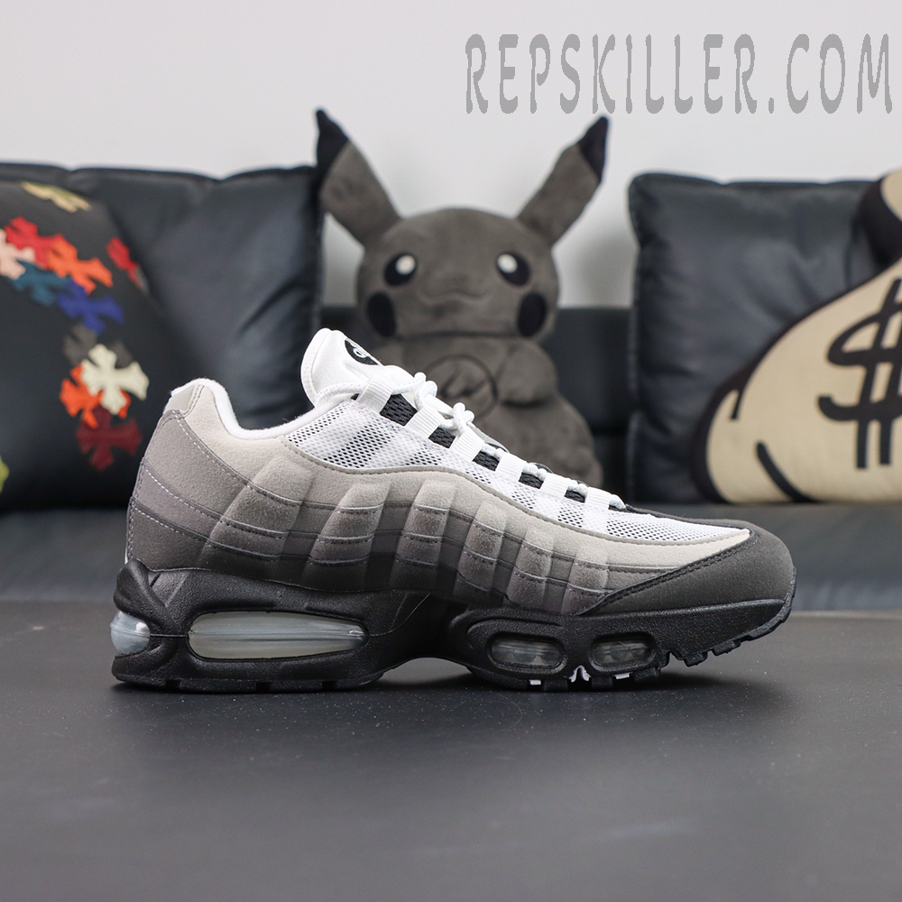 Nike Air Max 95 “Big Bubble - Granite” lateral side view with layered grey upper and oversized Air unit