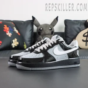 Side view with glossy black overlays and white Swoosh
