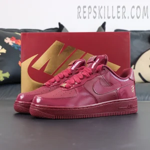 Central Cee x Nike Air Force 1 Low “Dark Beetroot” UK Exclusive in glossy burgundy patent leather with gold Nike shoebox