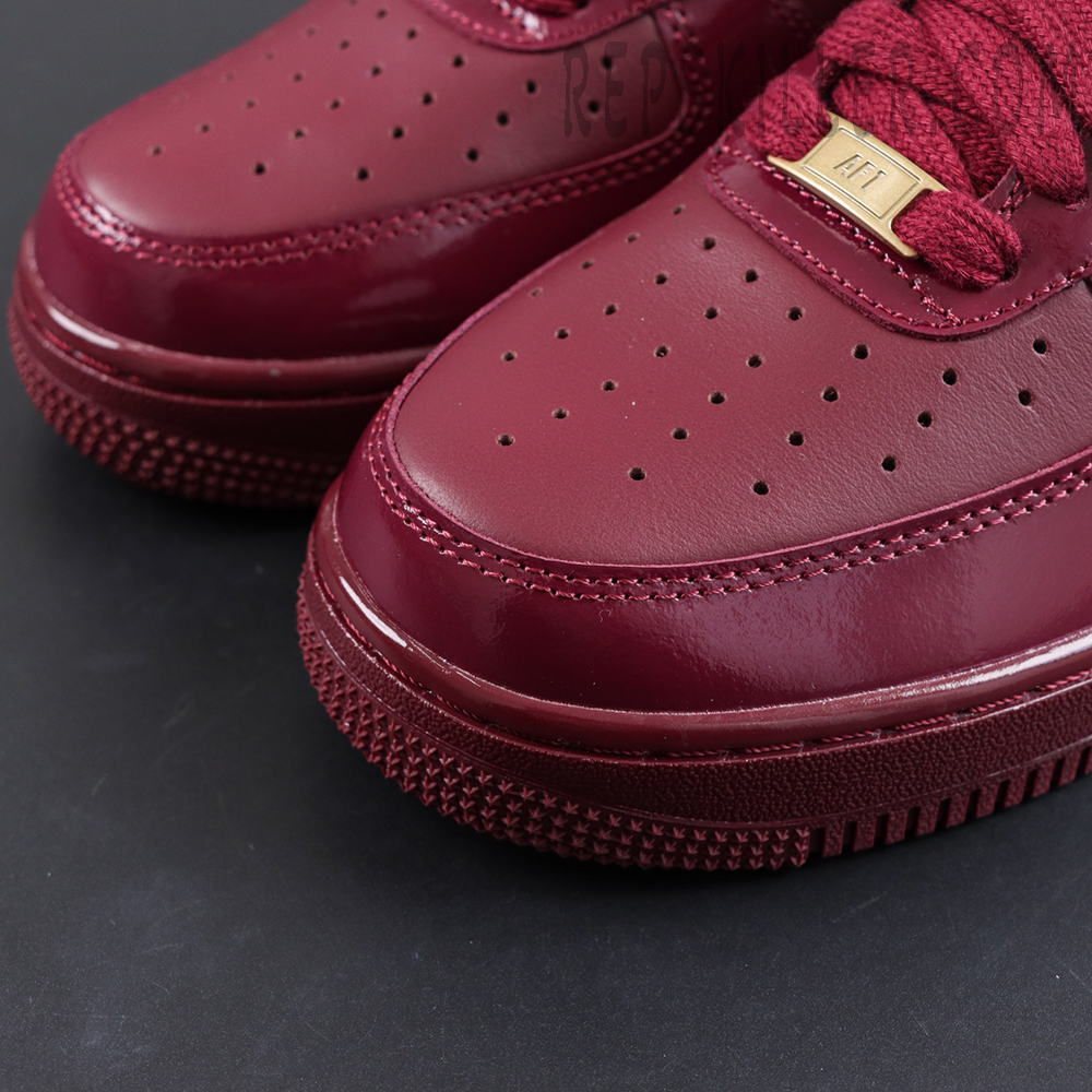 Central Cee x Nike Air Force 1 Low “Dark Beetroot” UK Exclusive toe box detail with perforated leather and metallic AF1 lace dubrae