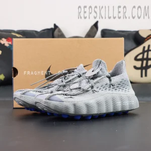 Fragment Design x Nike Mind 002 Flyknit “Particle Grey” displayed with shoebox showcasing its functional grey and blue aesthetic