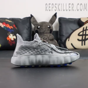 Fragment Design x Nike Mind 002 Flyknit “Particle Grey” lateral side view featuring lightweight grey upper and cushioned midsole