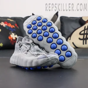 Fragment Design x Nike Mind 002 Flyknit “Particle Grey” outsole display featuring blue cushioning pods and Nike Mind Science Department branding
