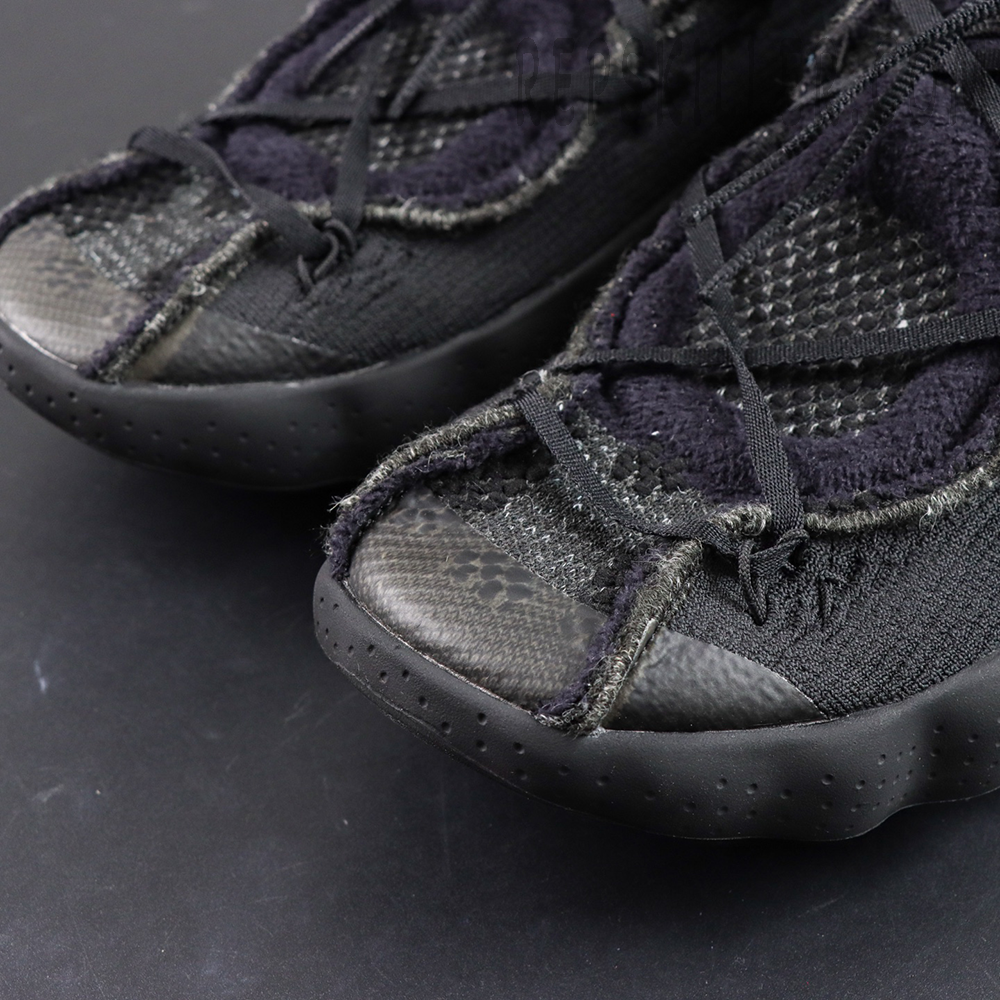 Fragment Design x Nike Mind 002 Flyknit “Black” toe box detail with fuzzy overlays and technical lace system