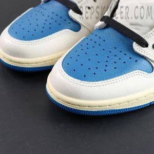 Toe box close-up with blue perforated leather