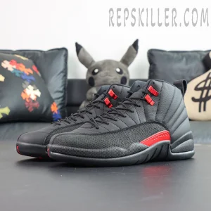 Air Jordan 12 Retro “Bloodline” pair display with black leather upper and red metallic lace hooks