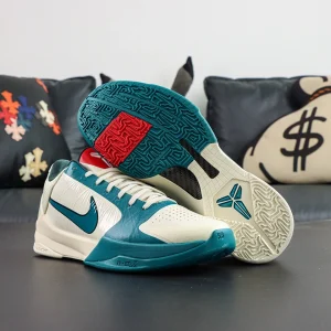 Kobe 5 Protro Caitlin Clark Coconut Milk outsole view with teal and red rubber traction