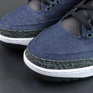 Levi’s x Air Jordan 3 Retro SP “Denim Blue” toe detail showcasing textured denim fabric and elephant print mudguard