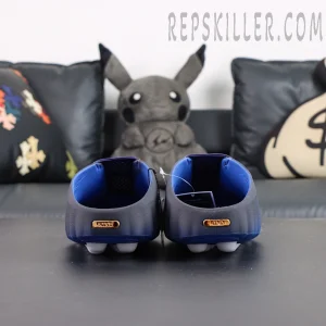 Nike Mind 001 heel view with metallic badge and chunky sole
