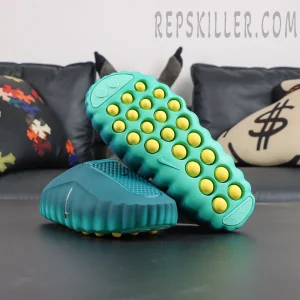 Nike Mind 001 “Geode Teal” outsole view with yellow cushioning pods and traction pattern