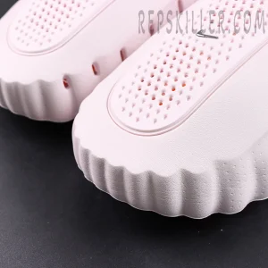 Nike Mind 001 “Pearl Pink” upper detail with soft pink texture and perforated ventilation