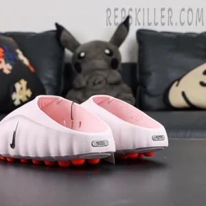 Nike Mind 001 “Pearl Pink” rear angle view with open-back entry and metallic heel badge