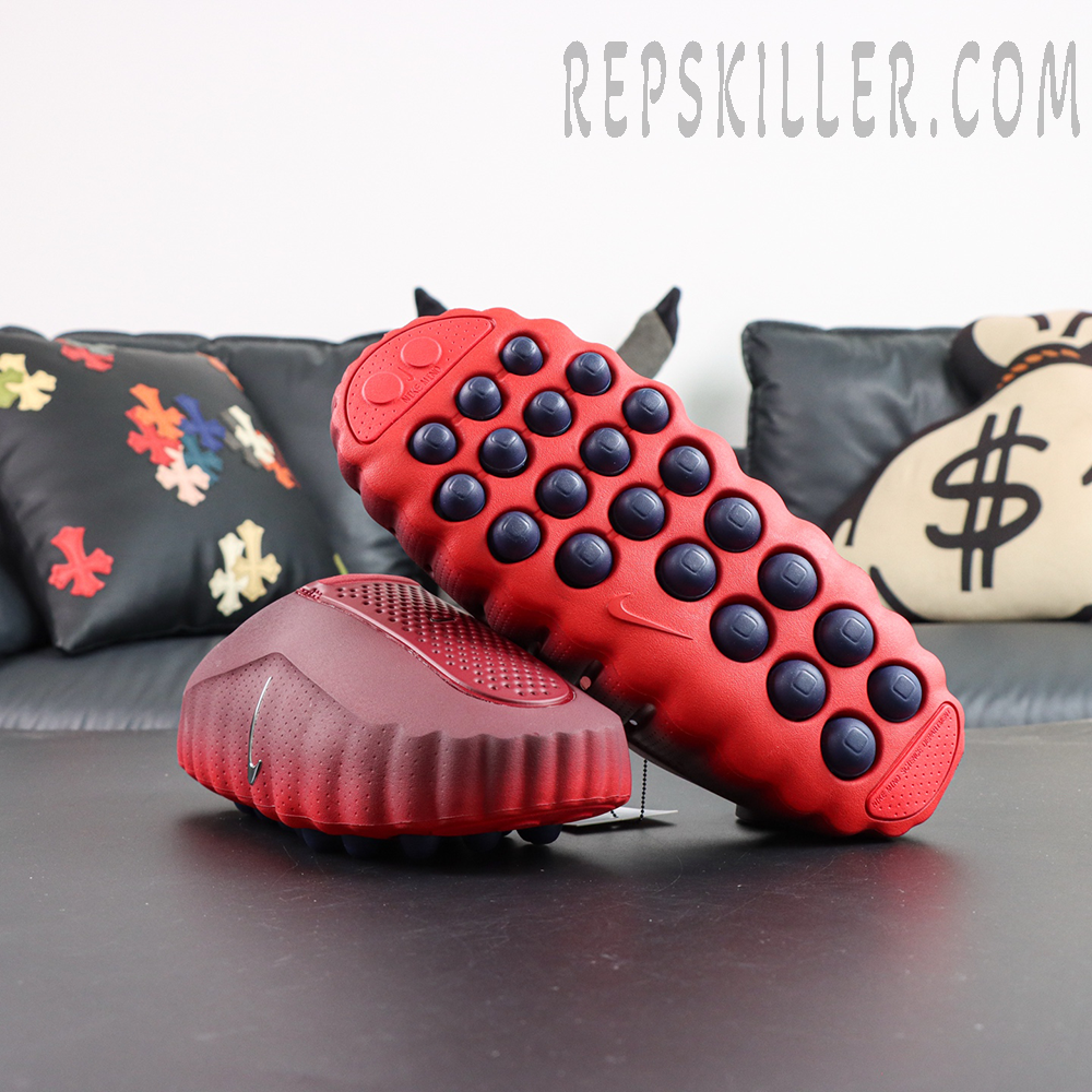 Nike Mind 001 outsole with red base and black massage nodes