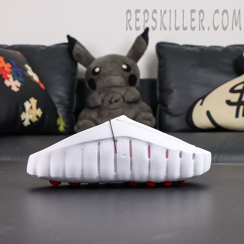 Nike Mind 001 “White Speed Red” side profile with futuristic all-white molded silhouette