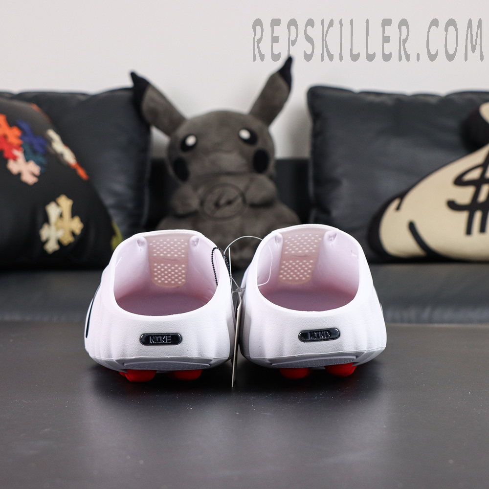 Nike Mind 001 “White Speed Red” heel view with open-back entry and metallic heel branding