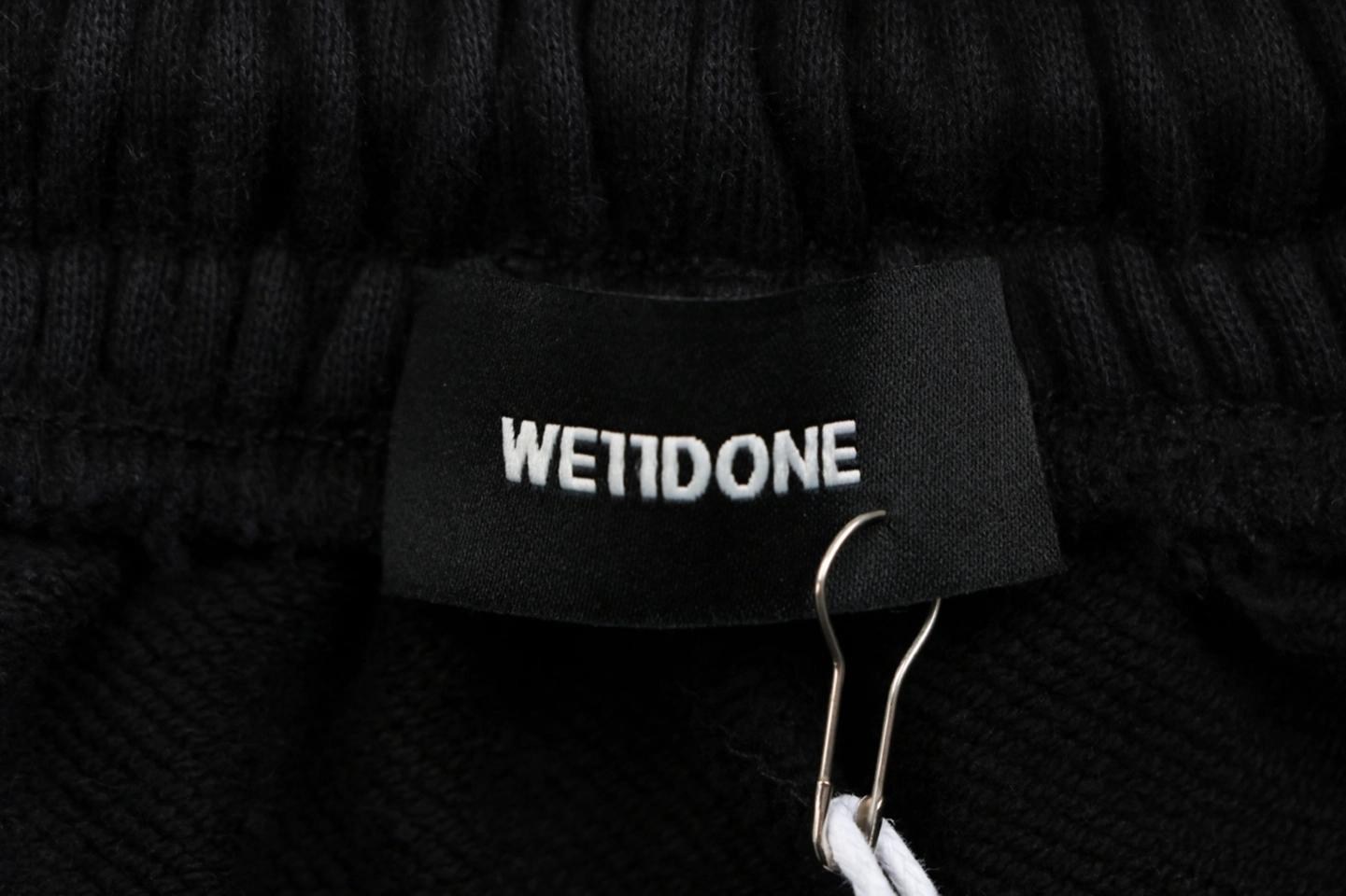 We11done Distressed Gothic Logo Shorts Brand label