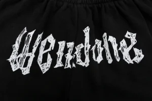 We11done Distressed Gothic Logo Shorts Front Print