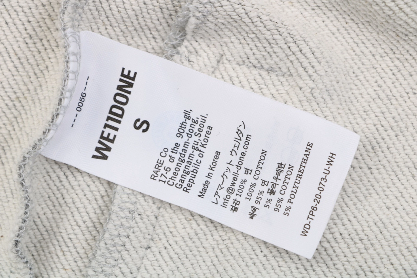We11done Distressed W Logo Sweat Shorts Grey Wash label