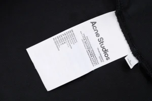 Acne Studios Logo Embroidered Polo T-Shirt Wash label