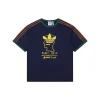 Ad x Brain Dead Trefoil Graphic T-Shirt
