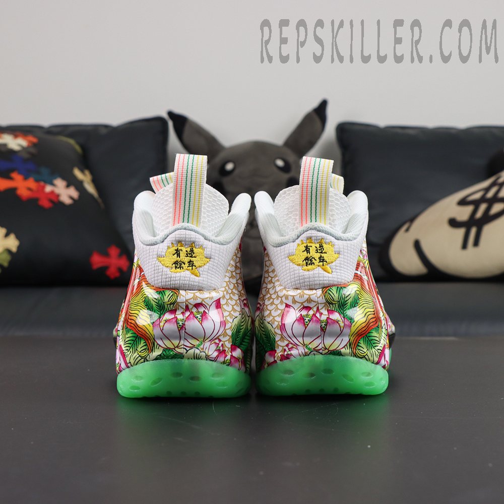 Nike Air Foamposite One Pro “Tianjin 2.0” rear heel view featuring embroidered Chinese characters with lotus and koi fish artwork