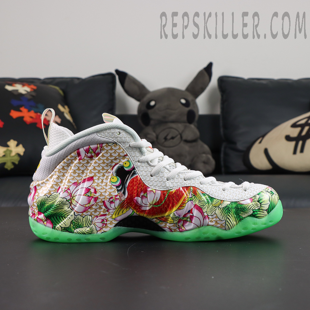 Nike Air Foamposite One Pro “Tianjin 2.0” lateral side profile featuring koi fish character artwork, lotus-inspired graphics, and glow outsole