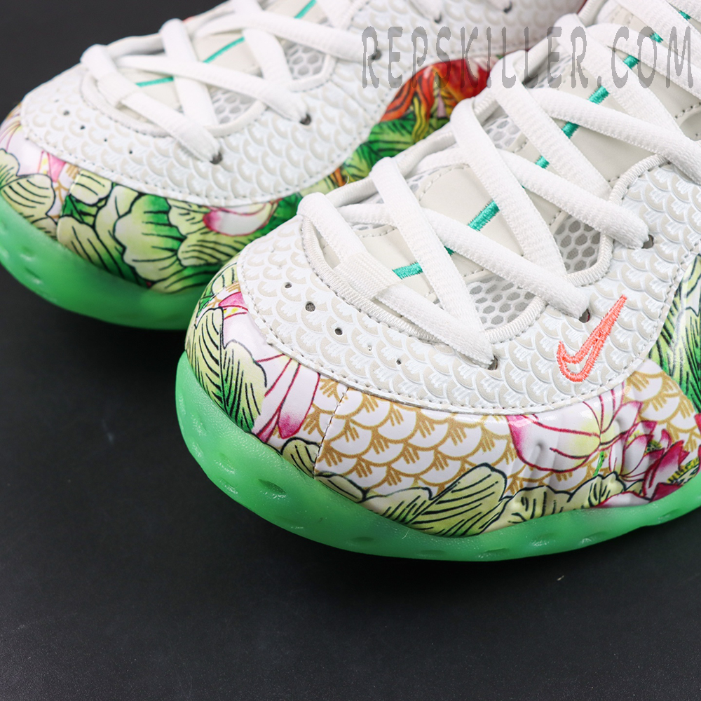 Nike Air Foamposite One Pro “Tianjin 2.0” toe box detail featuring white scaled texture upper, lotus floral graphics, and glow green outsole