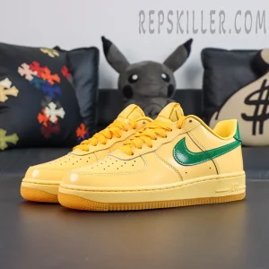 Nike Air Force 1 Low “Patent Leather Topaz Gold” angled front view featuring the classic low-top silhouette with glossy patent leather upper