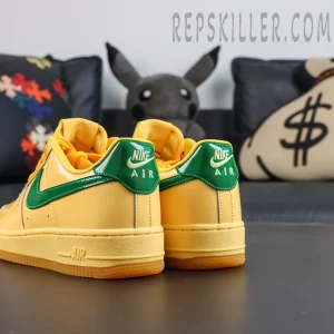 Nike Air Force 1 Low “Patent Leather Topaz Gold” rear side angle featuring standout green heel tabs and glossy Swoosh details