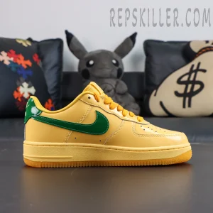 Nike Air Force 1 Low “Patent Leather Topaz Gold” side profile featuring a glossy yellow upper with green patent leather Swoosh detailing